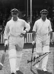 An autographed photograph showing Sir Don walking out to bat with Archie Jackson (L) in England in 1930.
