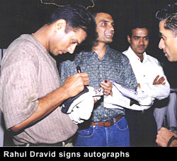 Rahul Dravid signs autographs
