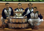 The victorious Spanish team with the Davis Cup they won last year.