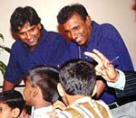 Arjuna Ranatunga with teammates