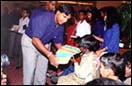 Sri Lankan team members with Bombay's street
kids